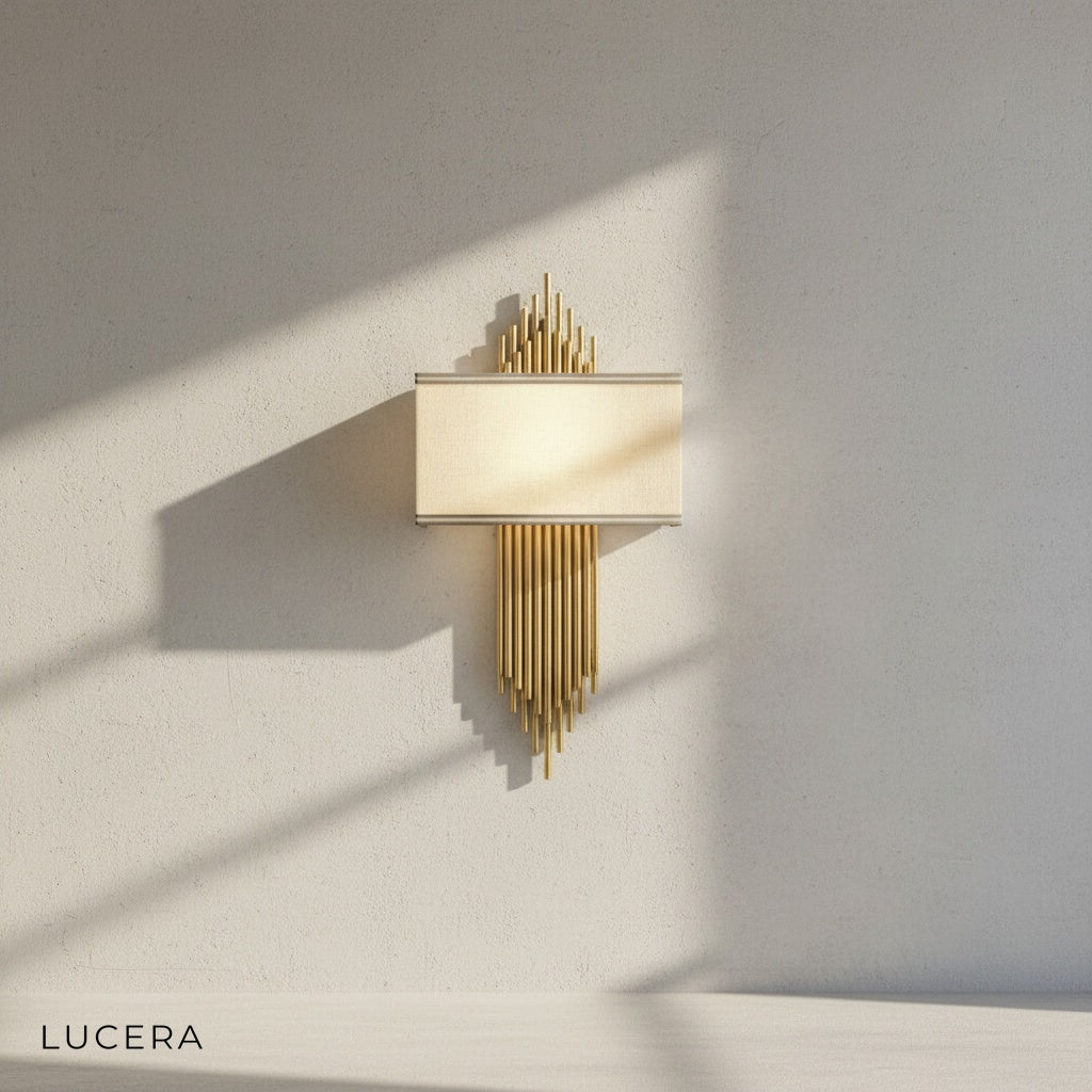 Leone wall sconce with warm LED light illuminating hallway wall in contemporary home