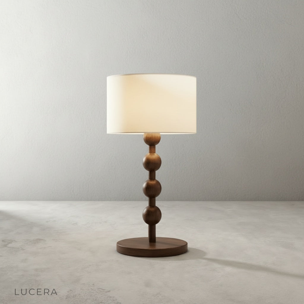 minimalist studio view of Lucera Boreal Table Lamp showing sculptural wood grain and soft linen shade