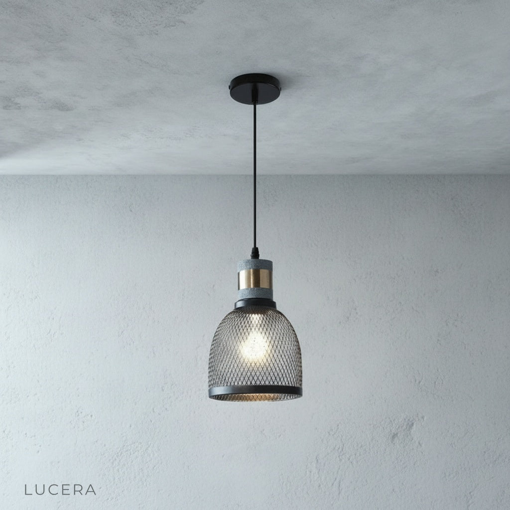 minimalist Pontiff pendant light hanging alone against neutral studio backdrop