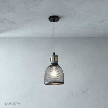 minimalist Pontiff pendant light hanging alone against neutral studio backdrop