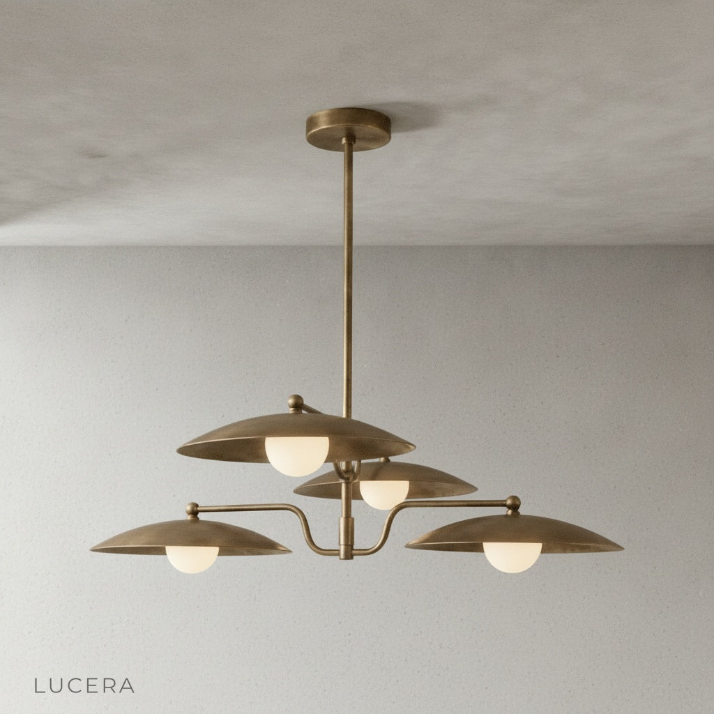 Studio shot of Stellar Brass Chandelier side angle showing four dome shades and central stem