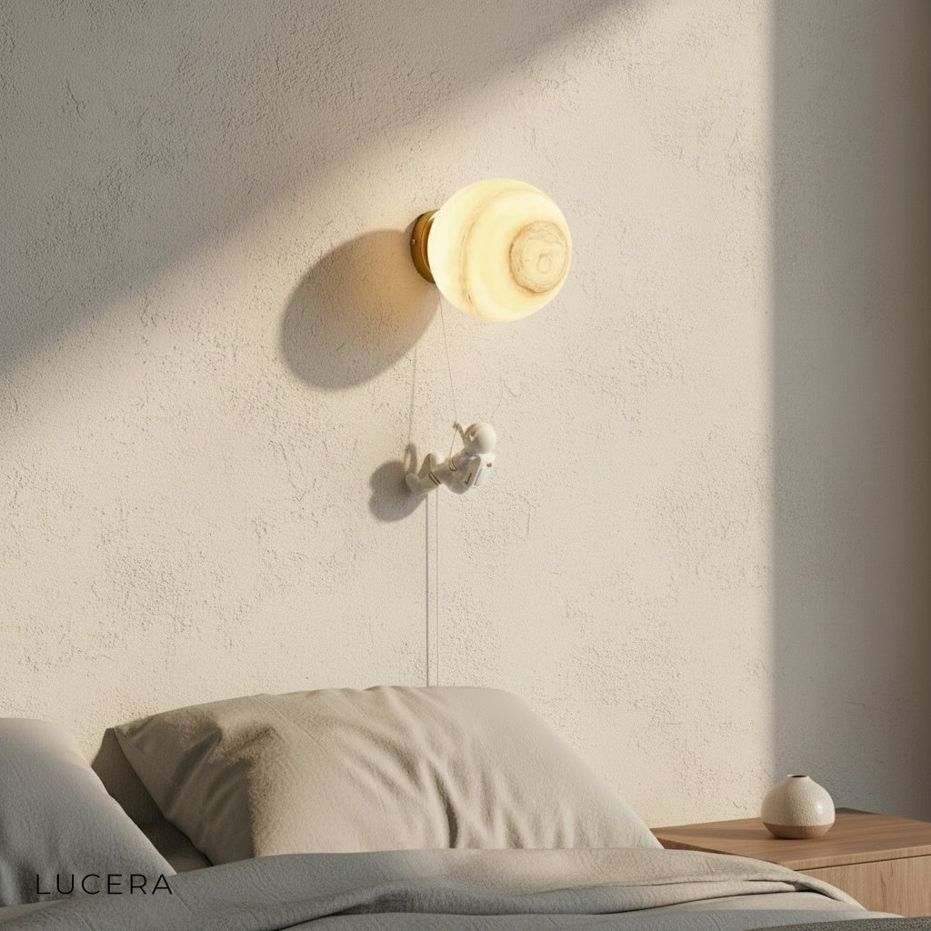 close-up of dimmable warm LED bulb inside the planet sconce's glass shade