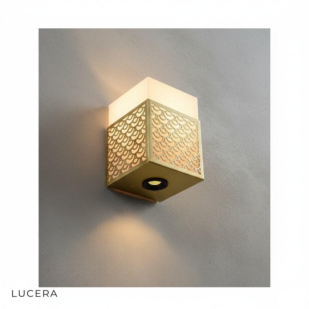 Gold and black Astragal marble wall lamp variants side by side on neutral wall
