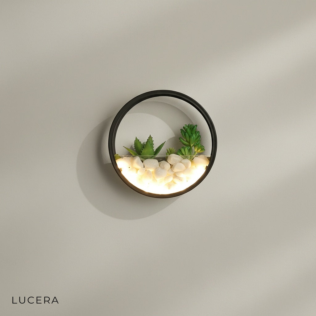 Laine outdoor sconce studio view showing imitation plants and stone texture