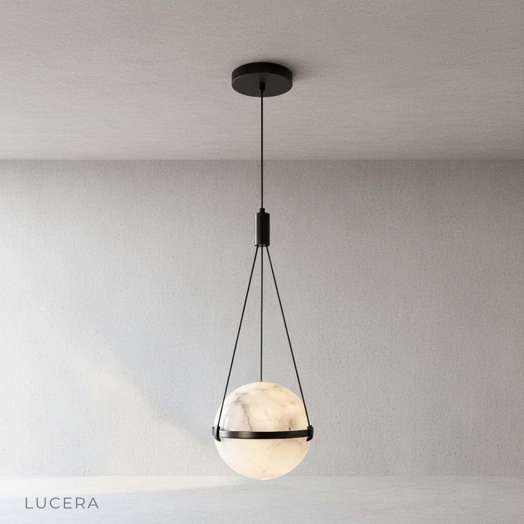Studio view of Seraphine Pendant Light three-point suspension and natural stone veining