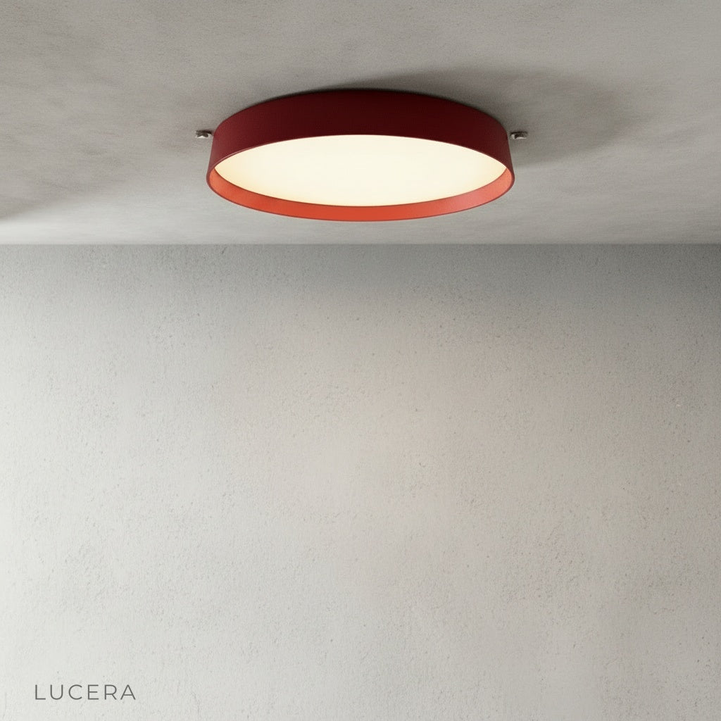 Studio view of circular aluminum and acrylic Xenith lamp from below