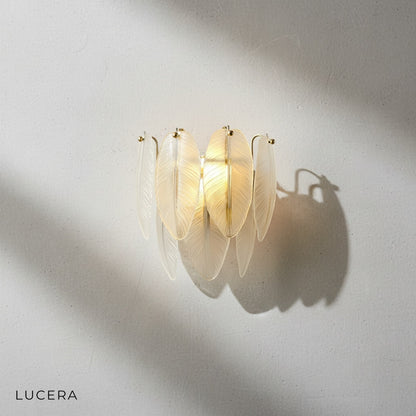Soli vintage chandelier hanging in an entryway with natural daylight filtering through