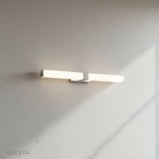 sleek linear wall lamp mounted on clean white studio wall