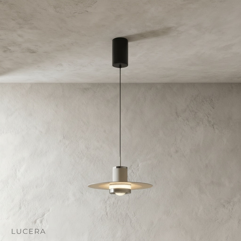 front view of zarzuela pendant light showing sleek disc and hanging loop detail