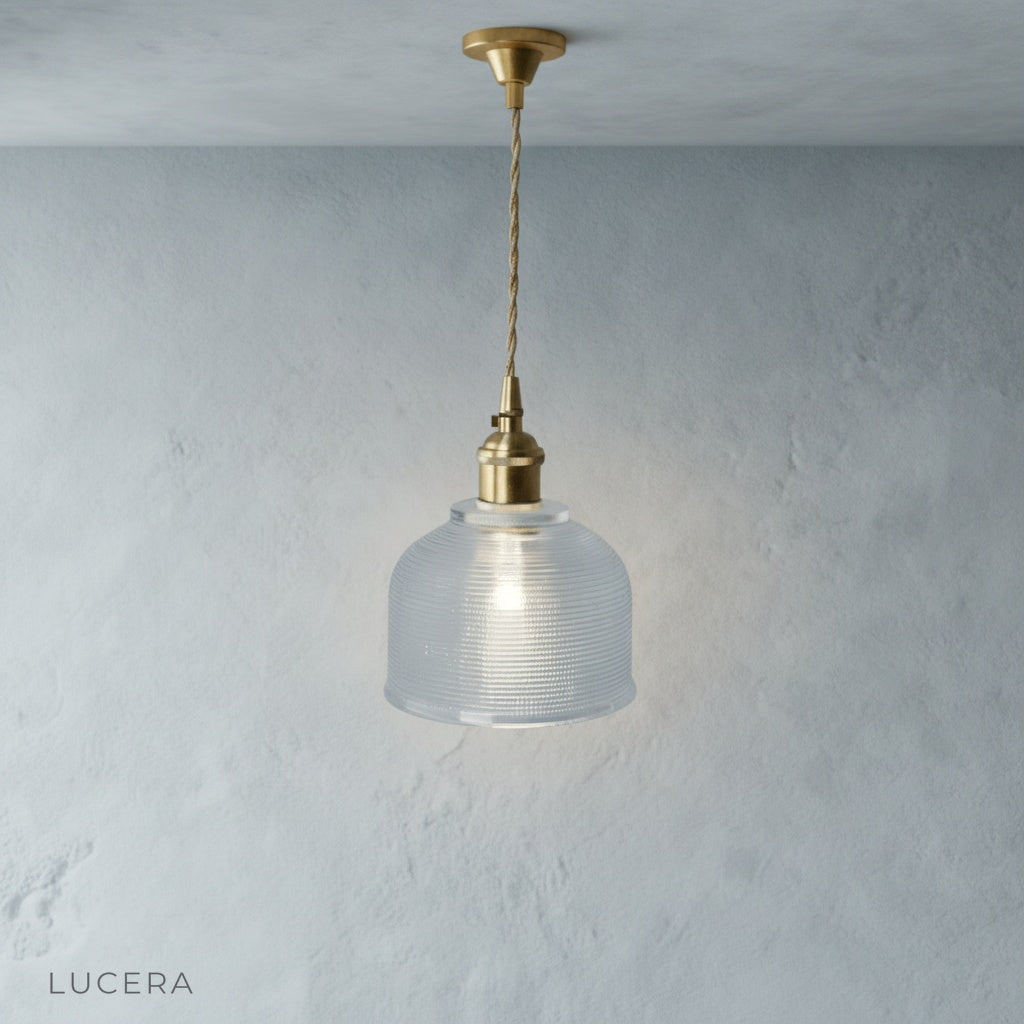 front view of Lucera Harmony Pendant Light with adjustable wire and LED bulb in studio lighting