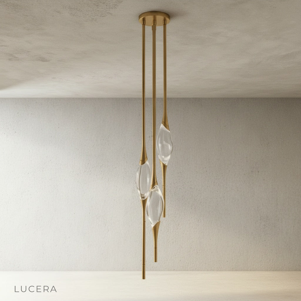 black Indus pendant light hanging from adjustable wire against clean white studio backdrop