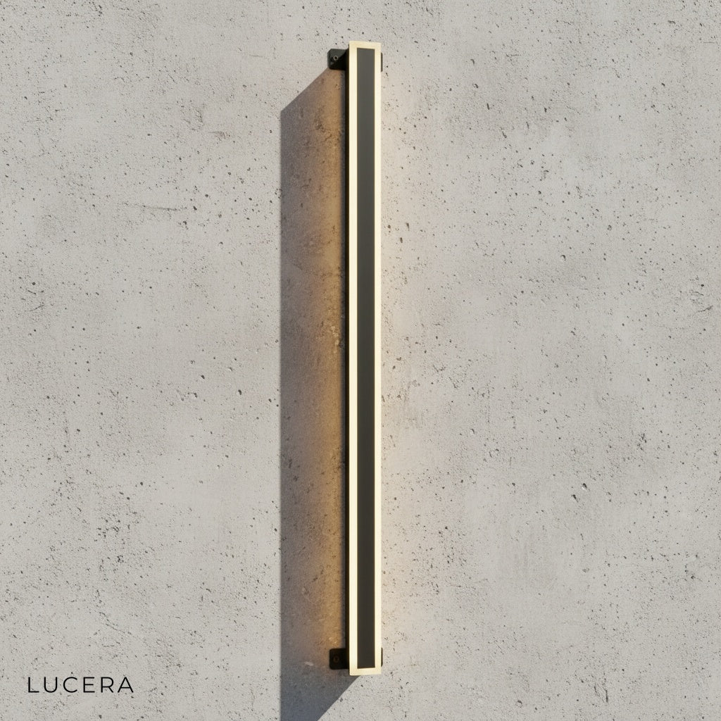 close-up detail of Odette wall lamp acrylic diffuser and aluminum frame texture in black