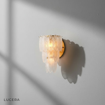 Albenga feather wall lamp with warm 3000K LED light in neutral bedroom