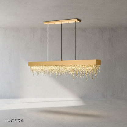 Close-up of Sol chandelier crystal details and black steel frame with gold trim