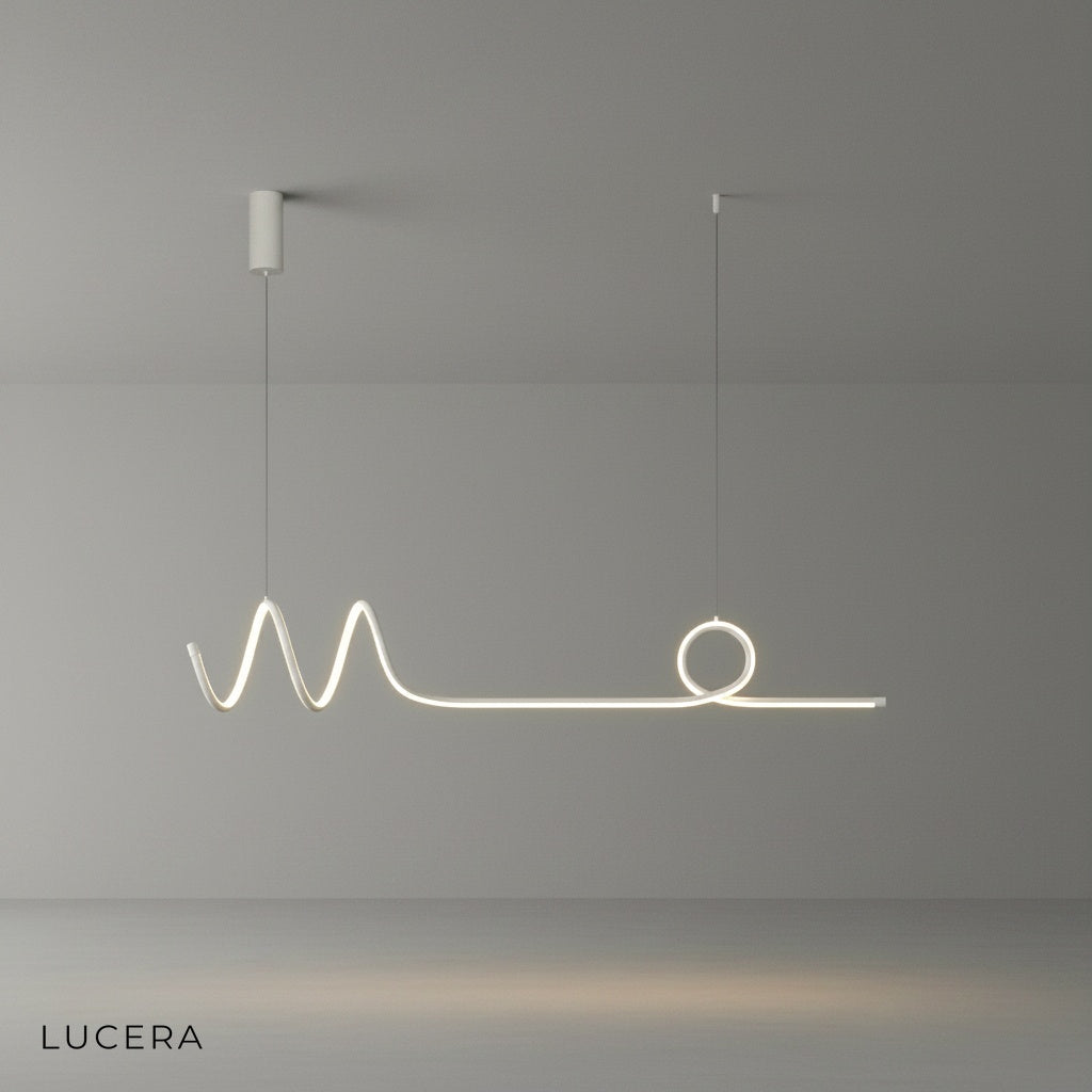 Eira Nordic pendant lamp with long strip, matte black finish, hanging in a minimalist studio setting