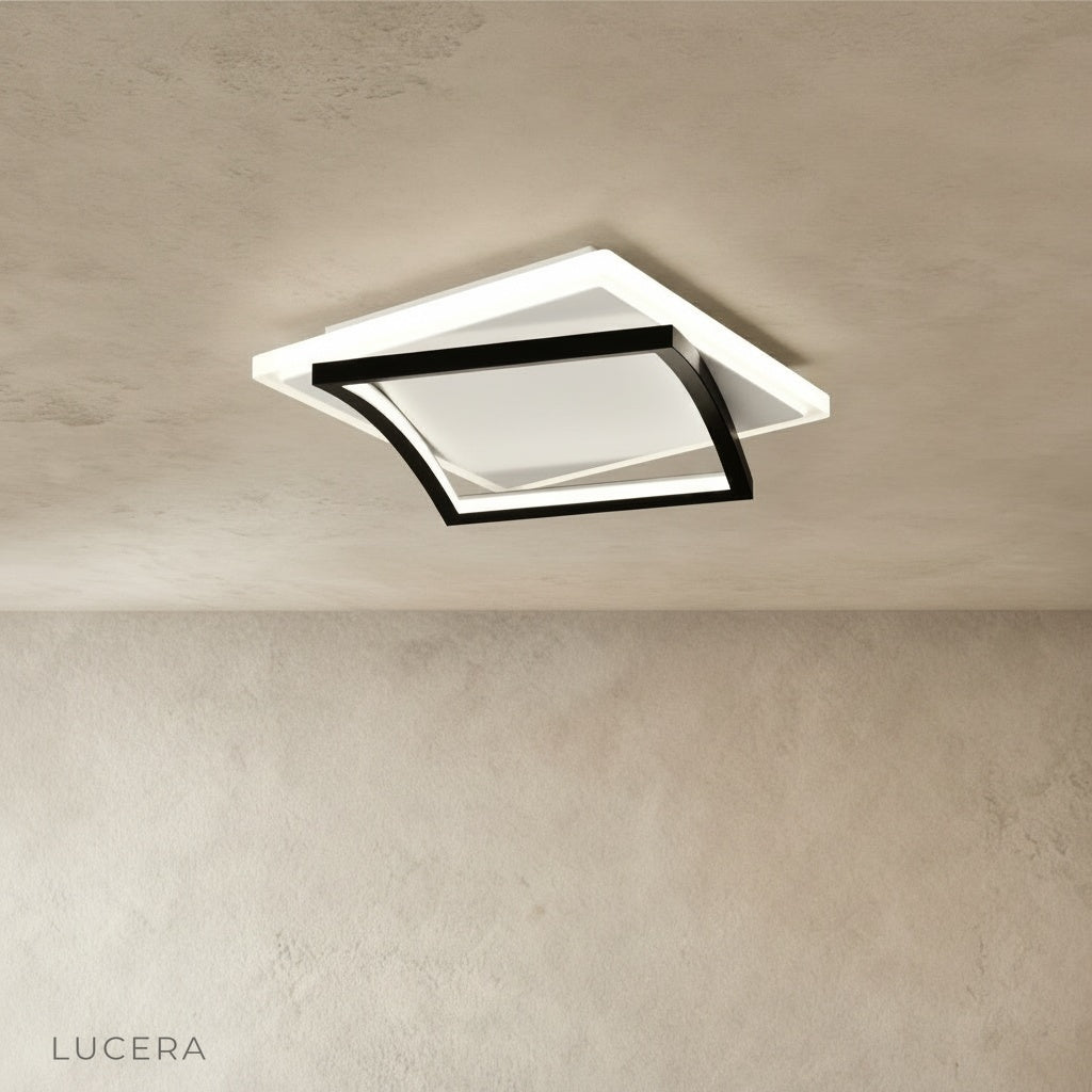 front view of broom ceiling light showing clean minimalist design in bright studio setting