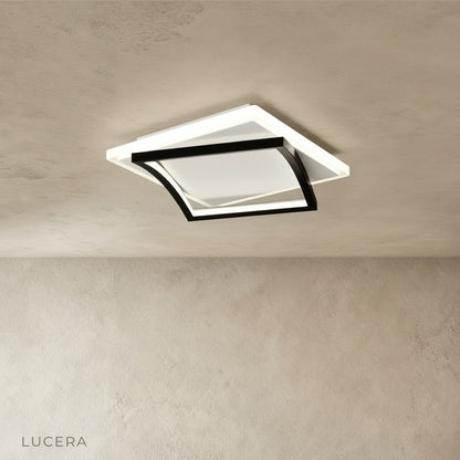 front view of broom ceiling light showing clean minimalist design in bright studio setting