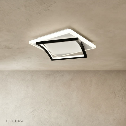 front view of broom ceiling light showing clean minimalist design in bright studio setting