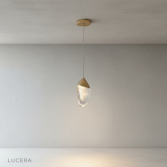 studio shot of Font pendant light with organic bubble crystal and metal top