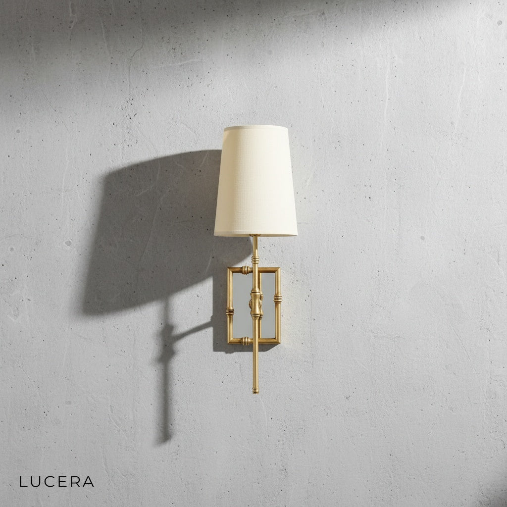 Grido wall lamp in black finish mounted on neutral wall close-up