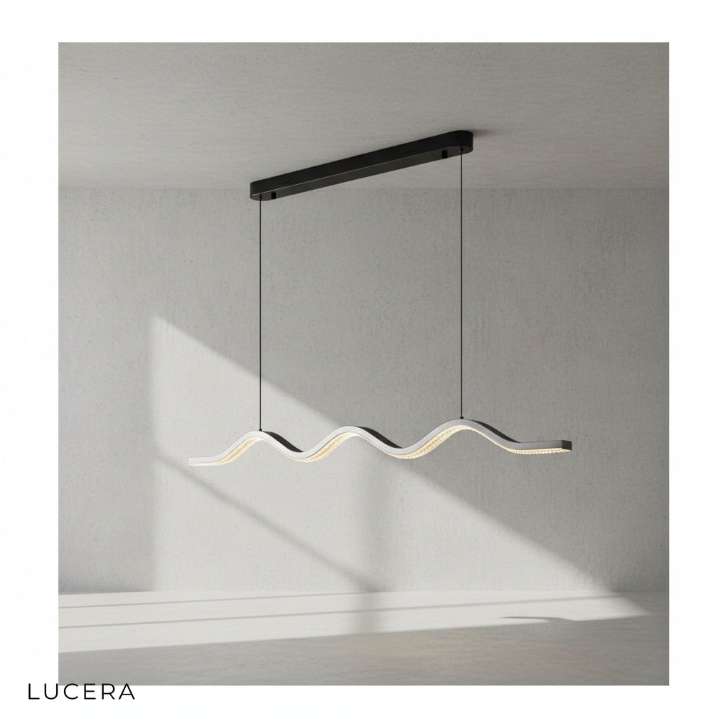 Cordovan wave pendant chandelier hanging above dining table with soft evening glow