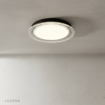 flush mount ceiling light front view with textured acrylic ring and smooth diffused center
