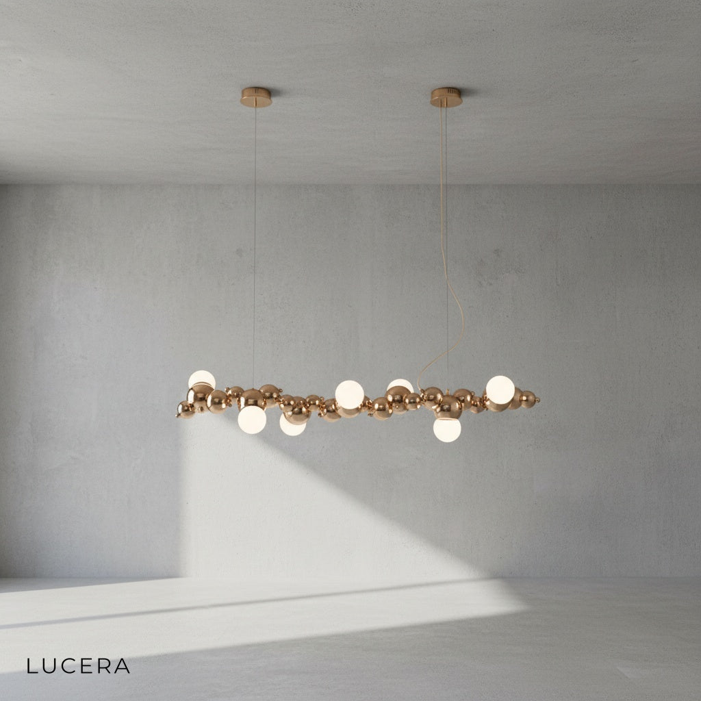 close-up detail of iron frame and hand-blown bubble glass globes on matte black chandelier