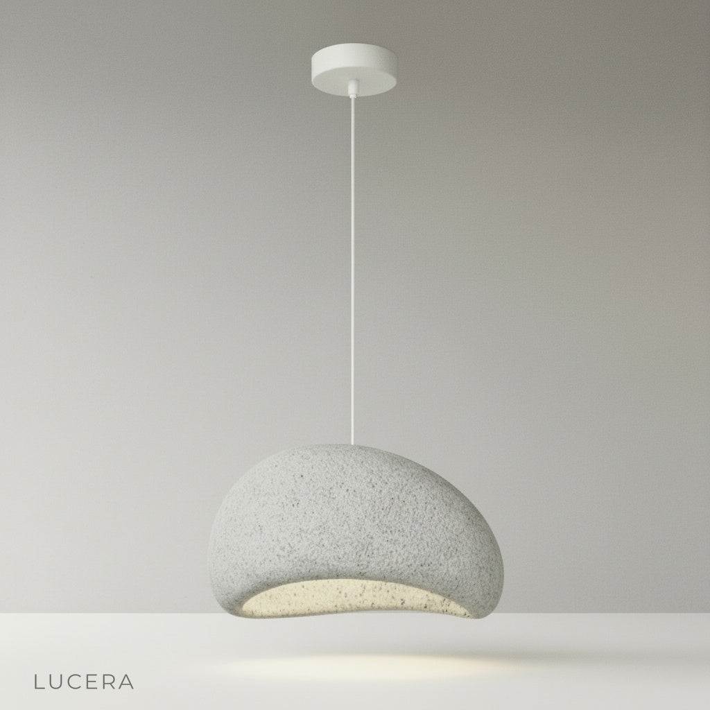 front view of textured sand finish pendant light with cord and canopy