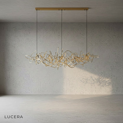 close-up of rose gold Isabelline rectangle chandelier showing reflective metal surface and sleek joints