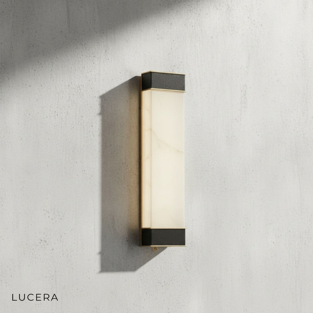 Marco wall lamp side angle showing rectangular silhouette and warm LED glow