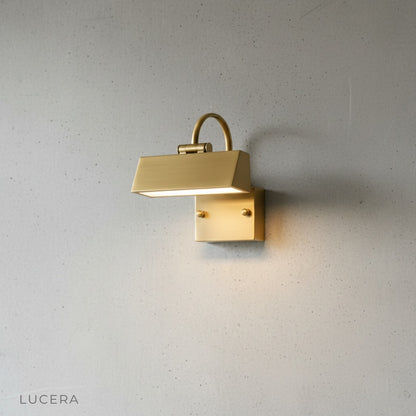 Studio view of Quiete acrylic outdoor sconce with adjustable up and down light