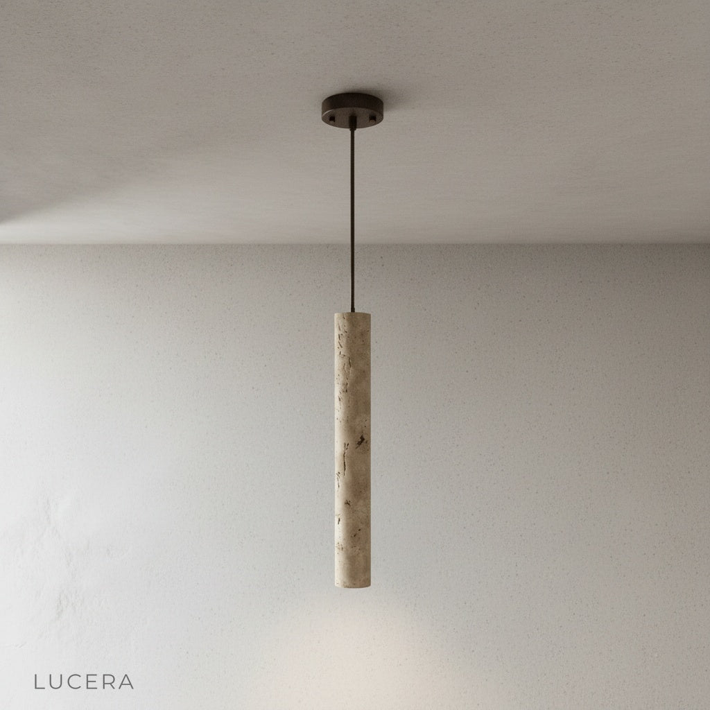 Minimalist travertine pendant light hanging from ceiling, front view, clean studio setting