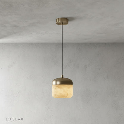 front view of Lucera Energico pendant light with polished copper details