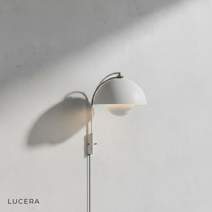 Coronal Nordic wall lamp in matte black finish close-up showing iron texture