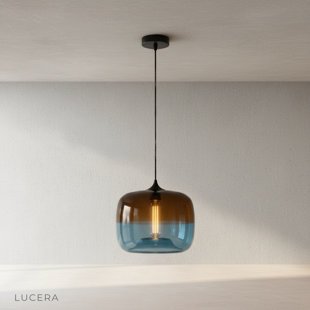 Minerva pendant light in green glass on clean white background, front view