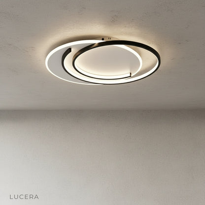 Zesty ceiling light gold finish with frosted acrylic diffuser in studio