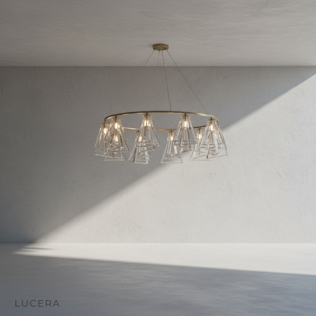 Front view of Bruma Chandelier showing geometric crystal arrangement against neutral studio backdrop