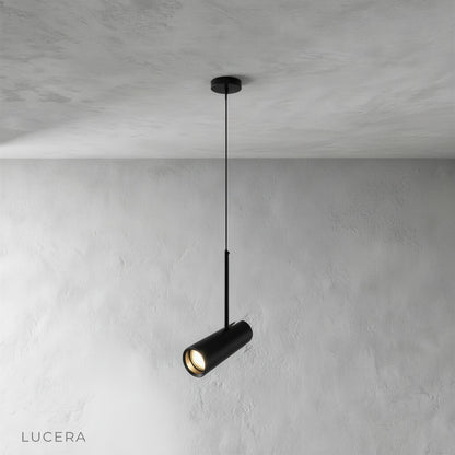 Studio shot of black Bistre pendant light with single cylindrical aluminum shade on clean background