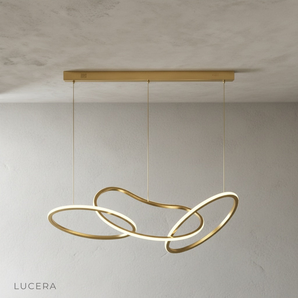Yakitori sculptural chandelier in a hotel lobby with high ceiling and reflective floor