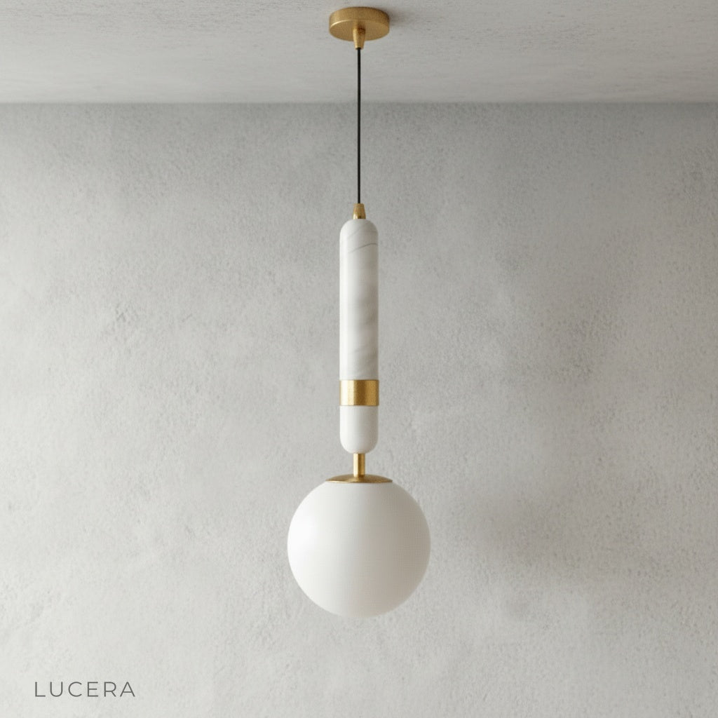 Cylindrical marble top pendant light with frosted glass globe front view