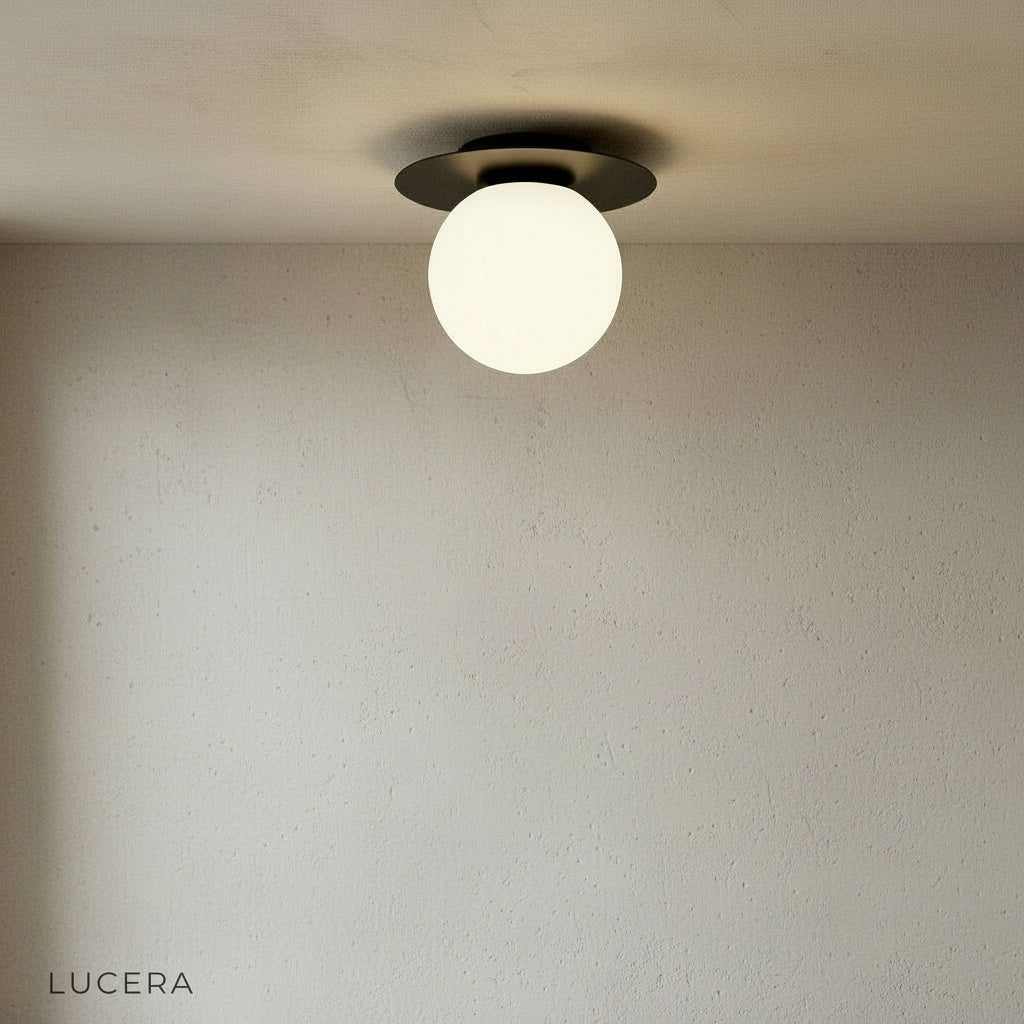 front view of Lucera Bijou ceiling light showing LED bulb inside glass globe