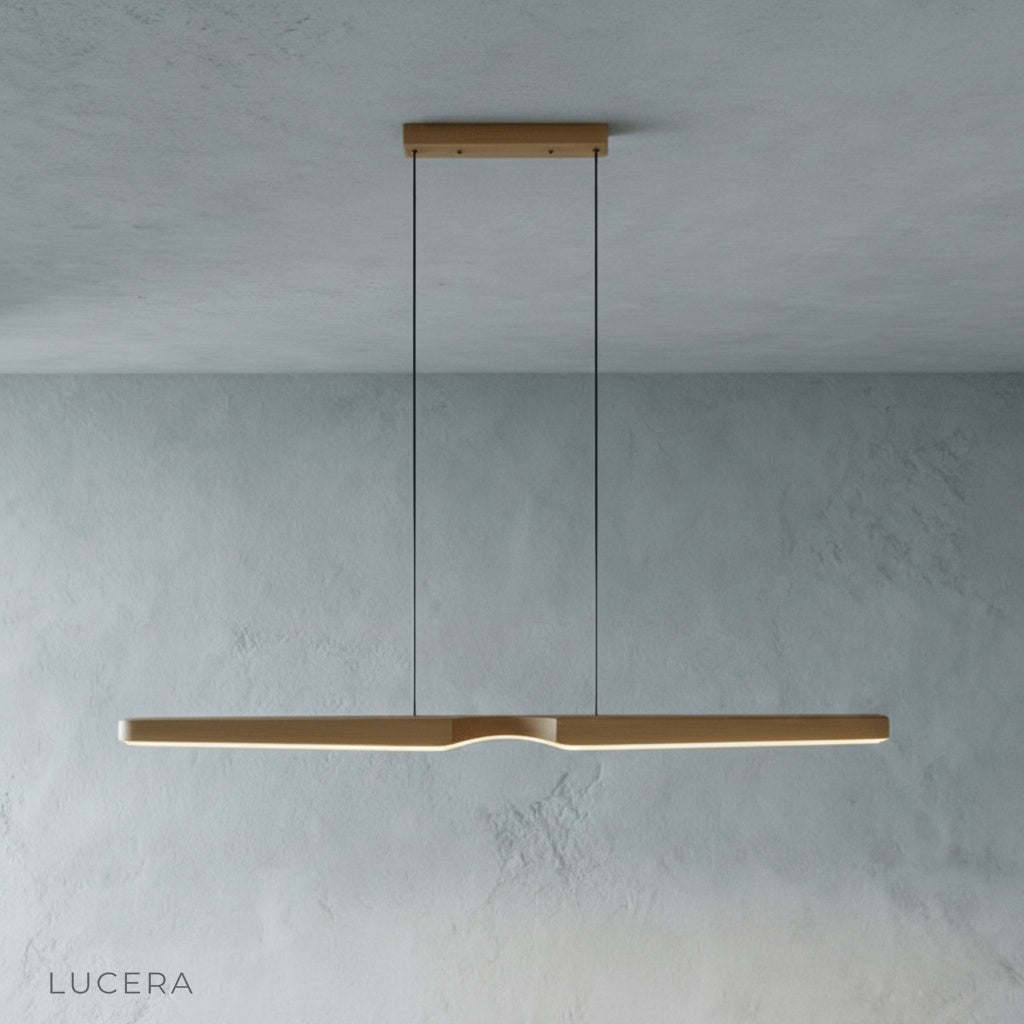 front view of Ember wood pendant light showcasing sleek wood grain and matte finish in studio setting