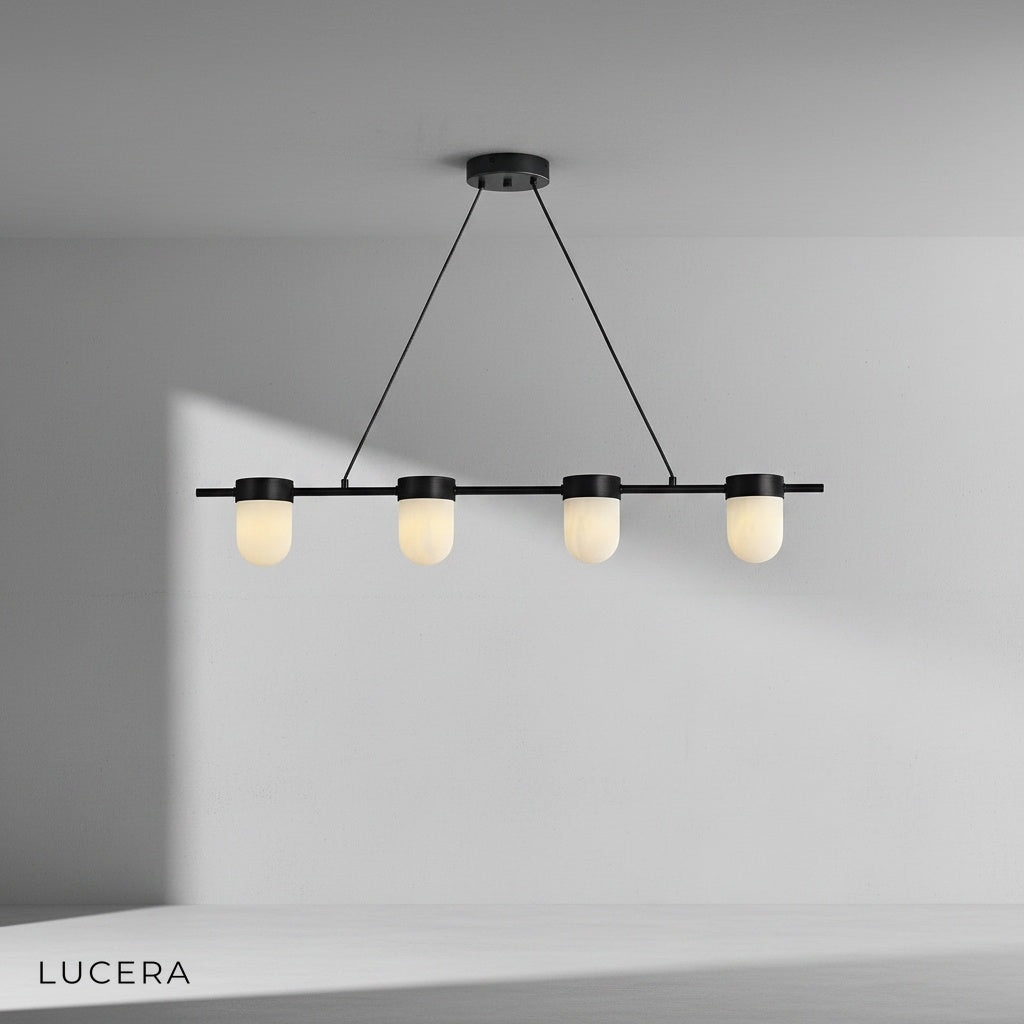 Overhead view of linear chandelier showing symmetrical arrangement of alabaster globes