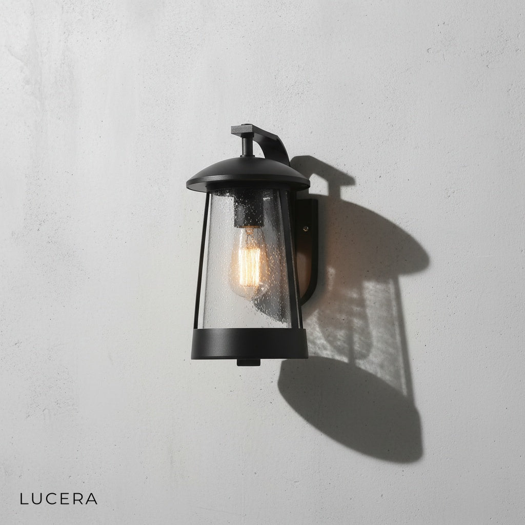 Camille LED wall sconce front view on neutral gray studio background