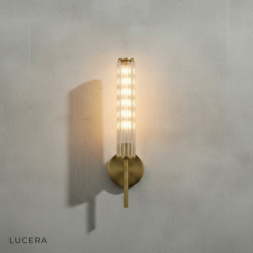 Close-up detail of copper frame and glass joint on Solo wall sconce