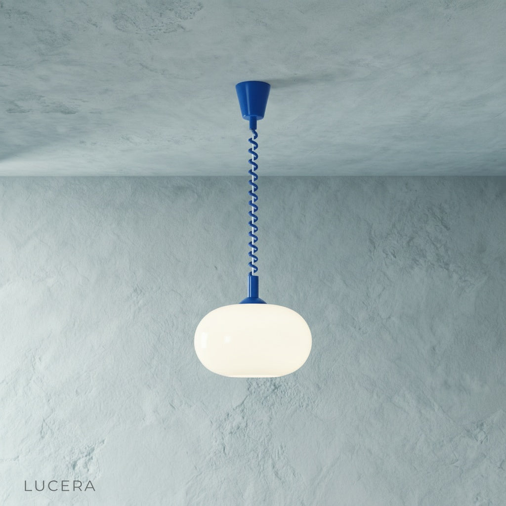 Xanthous pendant light studio side view showing rounded opal glass diffuser