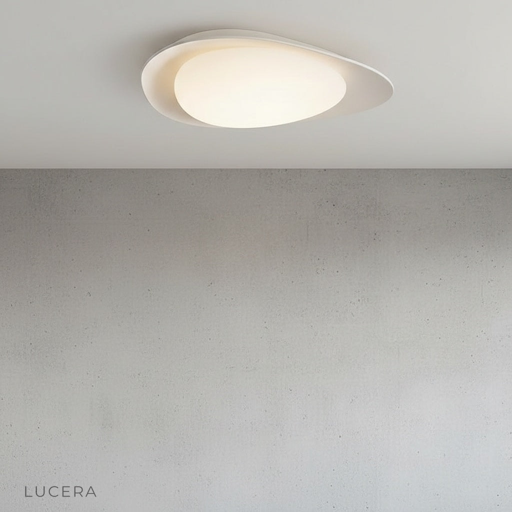 modern Saturn ceiling light glowing in cozy bedroom with warm ambient light
