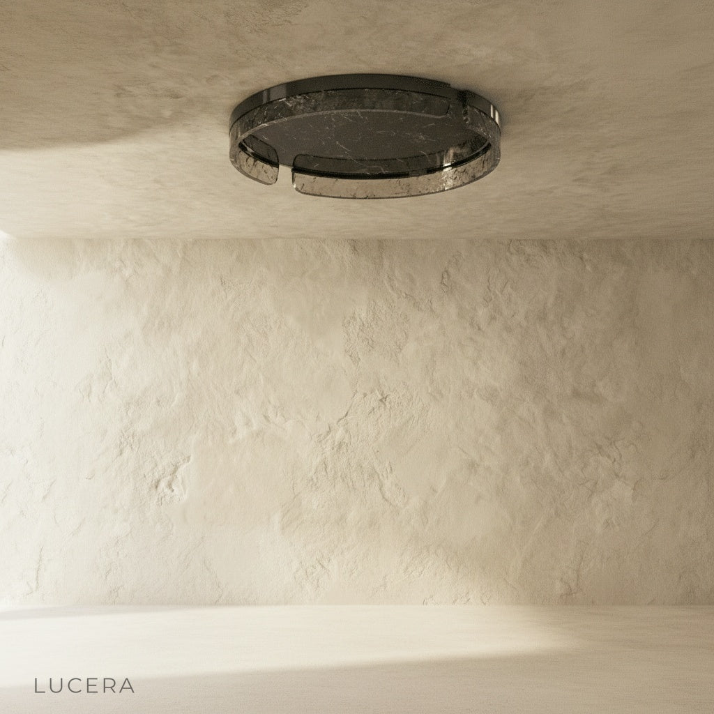 close-up of geometric metal cutouts on the Knight ceiling light against white background