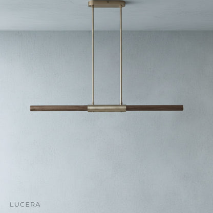 Griselda pendant light studio view from side angle highlighting copper and wood materials