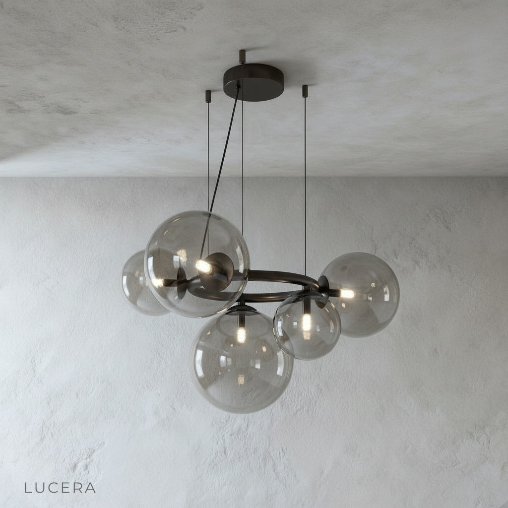 Grenache chandelier studio view showing circular metal frame and glass globes